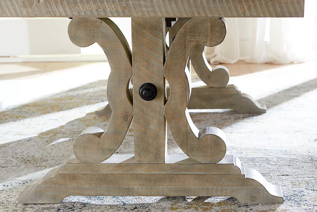 Closeup of the Blue Ridge Dining table legs in Dovetail Grey in a room scene.